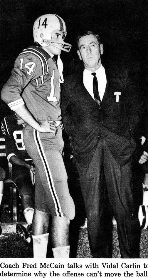 Coach Fred McCain talks to Vidal Carlin in 1965