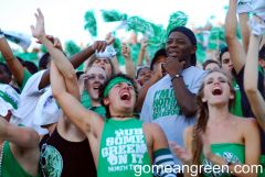 UNT Fan contemplates life whilest others around him rejoice