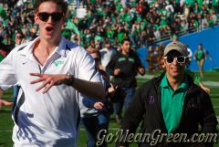 UNT Students rush The Cotton Bowl Field