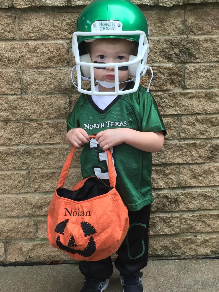 Nolan, age 2, dressed as a Mean Green football player